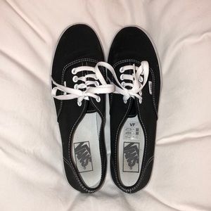 Black lace-up Vans